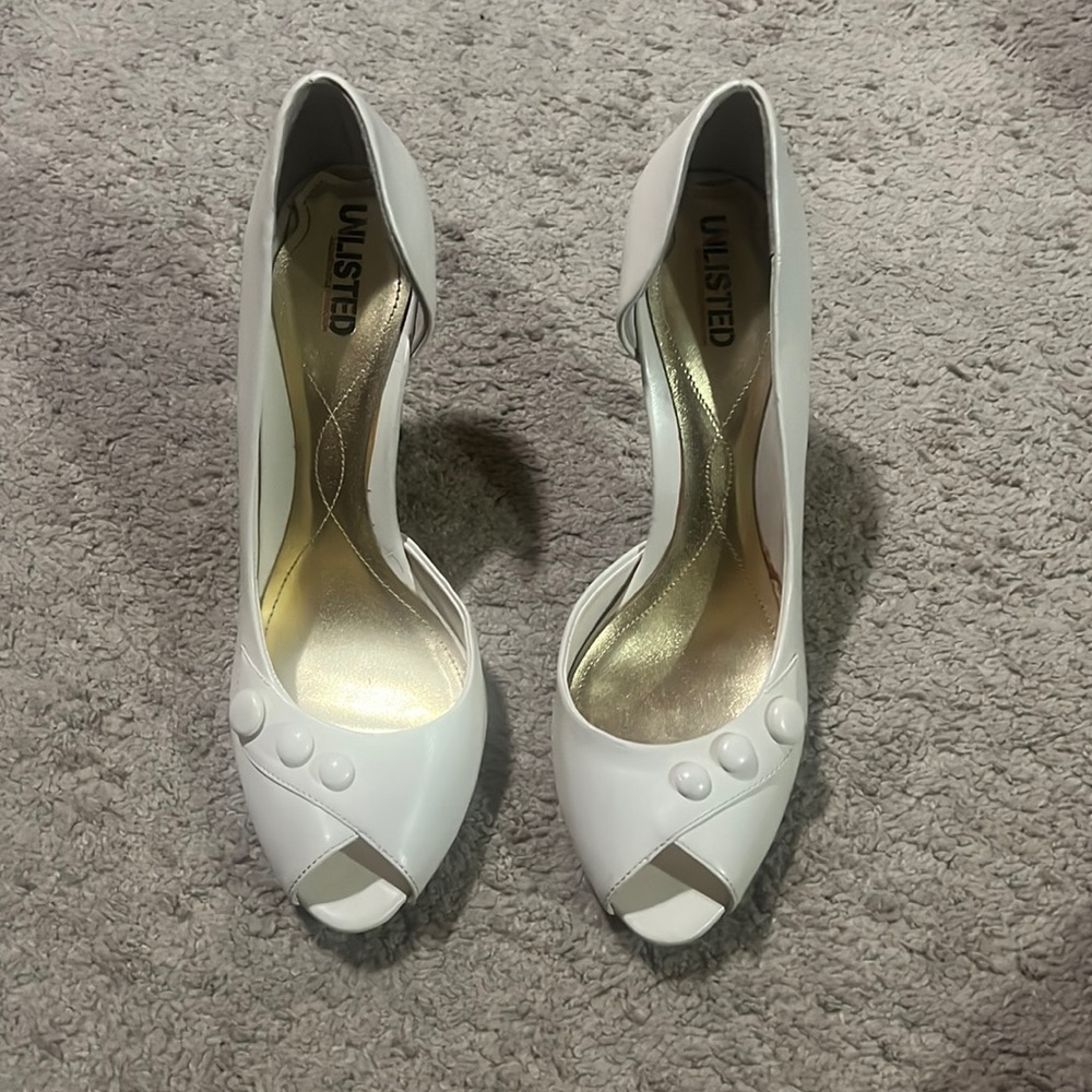 Off white. Gently worn!